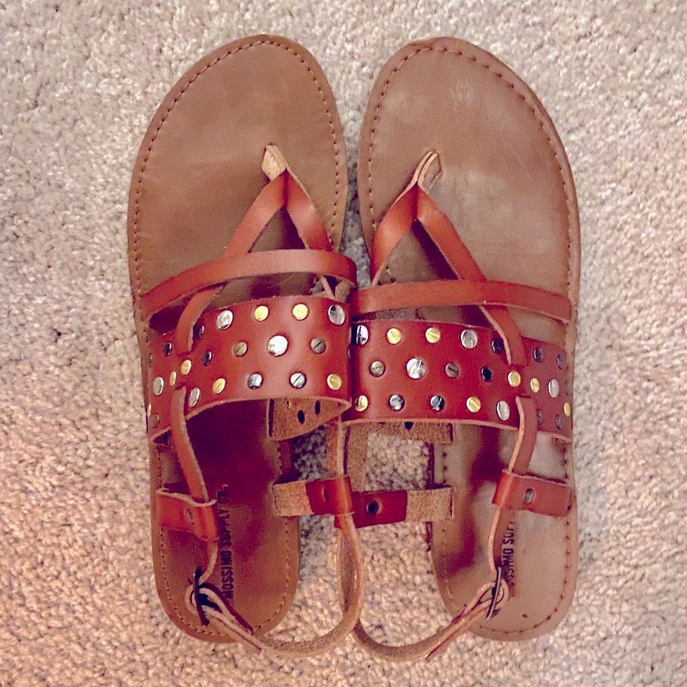 Strappy faux leather sandals with metallic embellishments